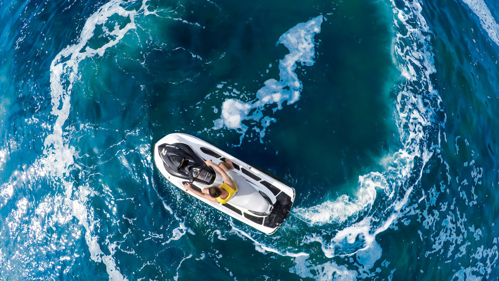 birdseye view of a jetski on the water
